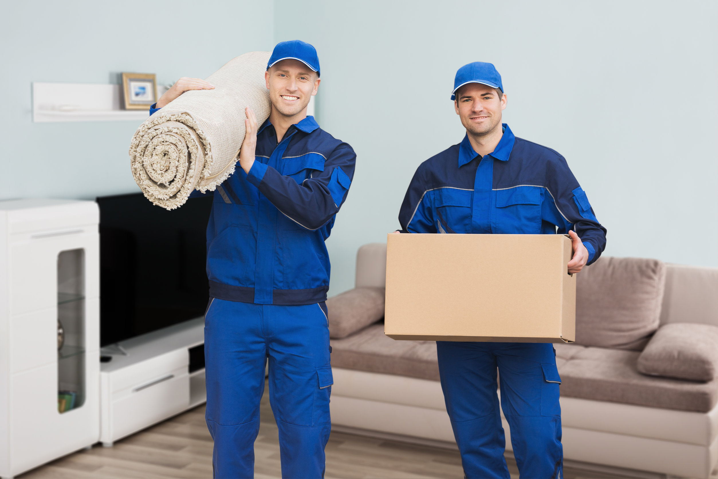 Men delivering carpet and boxes